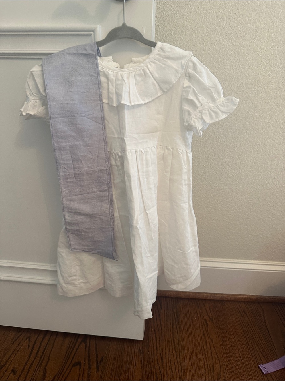 La Coqueta Vega Ceremony Dress with blue sash